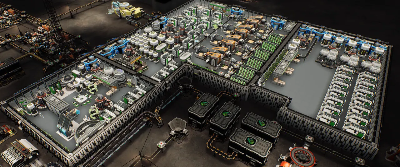 An elevated view of a large excavated colony arranged in walled sections, with rows of white and green storage pods, farm racks and conveyor lines packed between the walls
